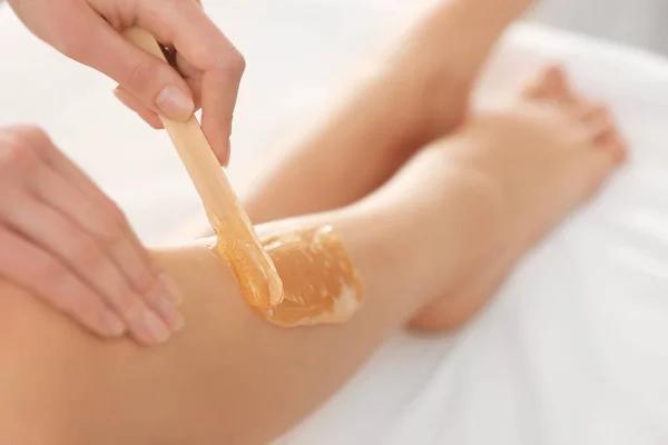 Achieve Silky Skin with Sugaring Hair Removal